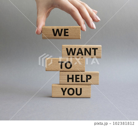 We want to help you symbol. Wooden blocks with words We want to help you. Beautiful grey background. Businessman hand. Business and We want to help you concept. Copy space. 102381812