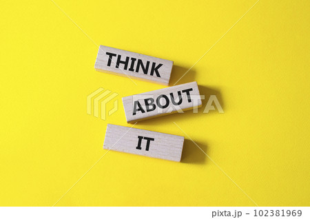Think about it symbol. Wooden blocks with words Think about it. Beautiful yellow background. Business and Think about it concept. Copy space. 102381969