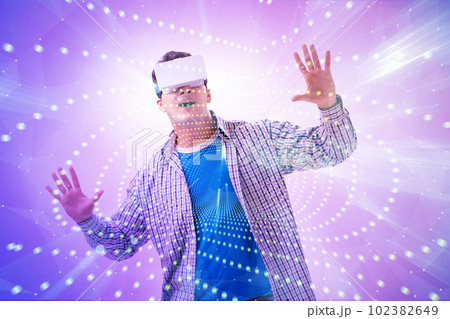 Metaverse concept with man and virtual reality glasses Metaverse concept with man and virtual reality glasses 102382649