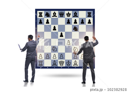 Business people playing chess on the board 102382928