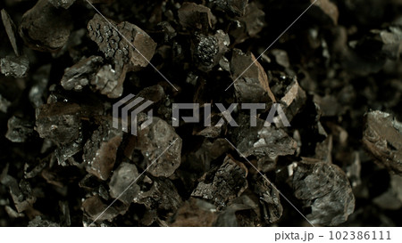 Flying coal with up in the air, top view shot. Flying coal with up in the air, top view shot. 102386111