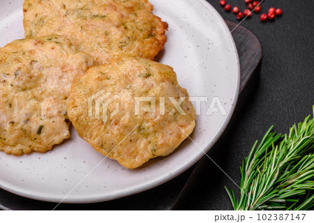 Delicious fried chopped fillet pancakes with spices, salt and herbs Delicious fried chopped fillet pancakes with spices, salt and herbs 102387147