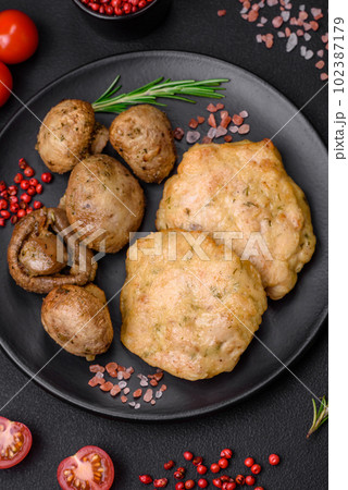 Delicious fried chopped fillet pancakes with spices, salt and herbs 102387179
