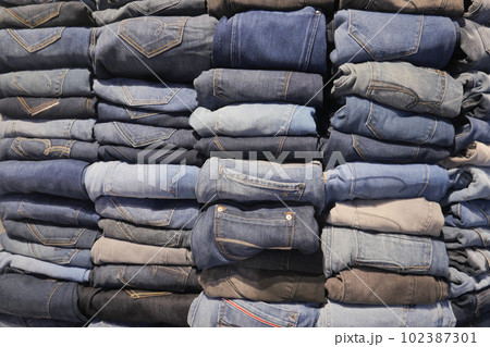 Stack of various blue jeans , Stack of various blue jeans , 102387301