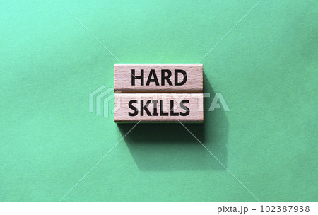 Hard skills symbol. Wooden blocks with words Hard skills. Beautiful green background. Business and Hard skills concept. Copy space. 102387938