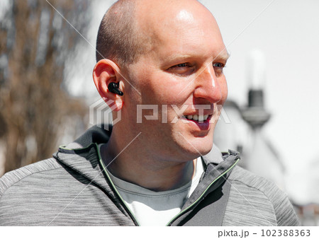 Portrait of a handsome hipster man. A man in a big city on the street, a life style concept 102388363