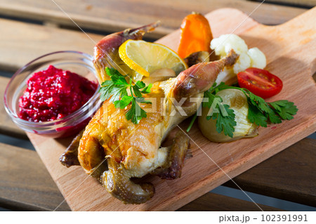 Poultry dish with cranberry sauce Poultry dish with cranberry sauce 102391991