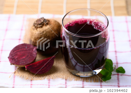 Fresh beetroot juice in glass, Healthy drink 102394402