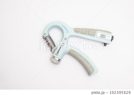 Hand Gripping Exercise to Exercise Fingers, Palm and Forearm on iSolated White Background 102395829