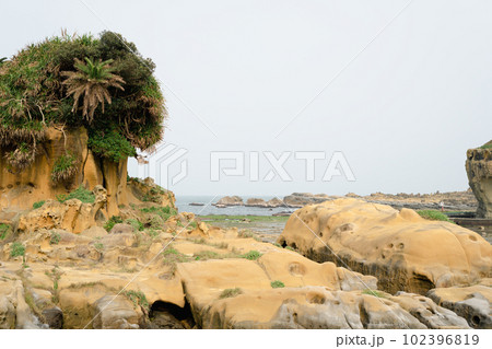 Heping Island Park coastal rock formation scenery in Keelung, Taiwan 102396819