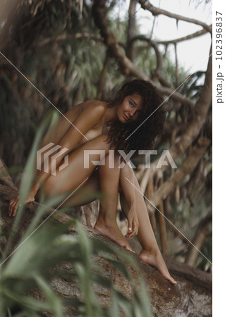 Bare Beach Woman Perfectly Tanned Outdoors in the Wild 102396837