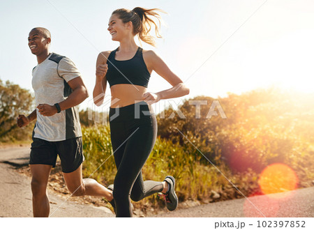 Fitness, running and health with couple in road for workout, cardio performance and summer. Marathon, exercise and teamwork with black man and woman runner in nature for sports, training and race 102397852