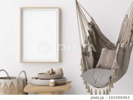 Blank vertical picture frame mockup in room. Boho style. Empty space for artwork, poster. Rattan basket, hanging macrame armchair. Wooden frame mock up, template. Close up view. 3D rendering. 102400463