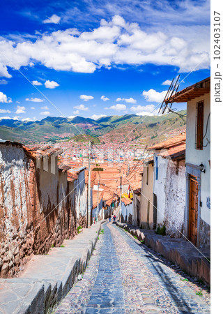 Cusco, Peru. Historic street, colonial architecture, bustling culture in South America. 102403107