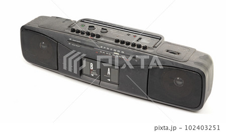 Old 1980s cassette deck with radio (FM and AM) and two cassette players 102403251