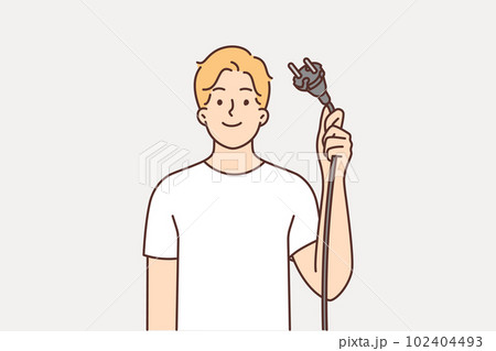 Man shows wire with plug from electrical equipment, offering to turn off appliances for save energy 102404493