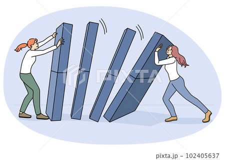 Businesswoman hold domino from falling down Businesswoman hold domino from falling down 102405637