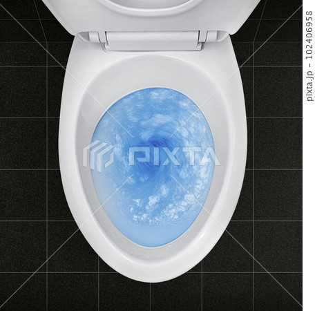 Top view of toilet bowl, blue detergent flushing in it Top view of toilet bowl, blue detergent flushing in it 102406958