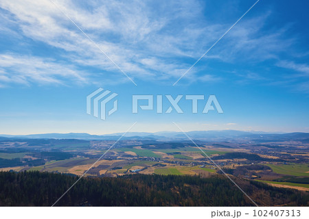 Natural landscape with mountain ranges and valleys 102407313
