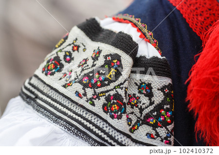 Details of costumes during traditional moravian festival in czech 102410372