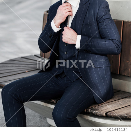 handsome man in elegant suit 102412184