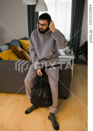 Sad man pondering about his life after a relationship breakup or bipolar disorder - depression asthenia , mental problem and anxiety disorder concept Sad man pondering about his life after a relationship breakup or bipolar disorder - depression asthenia , mental problem and anxiety disorder concept 102419964
