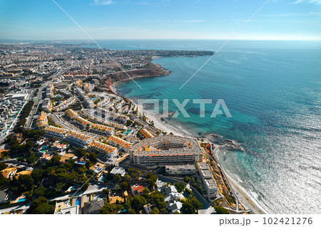 Dehesa de Campoamor seaside and townscape view from above. Spain Dehesa de Campoamor seaside and townscape view from above. Spain 102421276