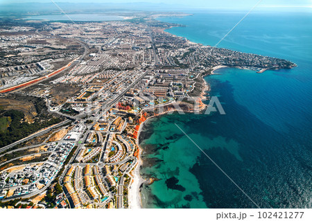 Dehesa de Campoamor seaside and townscape view from above. Spain 102421277