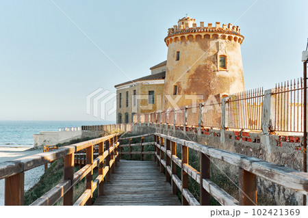 Wooden boardwalk lead to the Torre de la Horadada Wooden boardwalk lead to the Torre de la Horadada 102421369