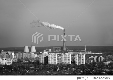 Kiev, Ukraine November 22, 2019: Pipes smoke, polluting the air in the city worsening the environment. 102422565