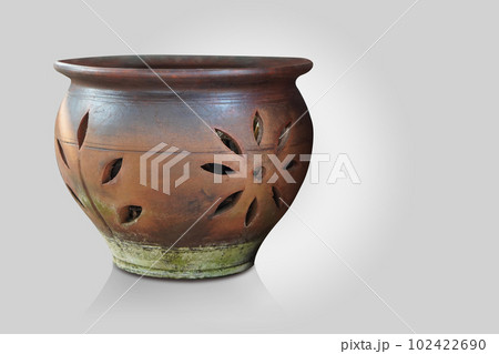 front view old brown and black clay pot on grey background, object, decor, modern, gift, ancient, vintage, copy space front view old brown and black clay pot on grey background, object, decor, modern, gift, ancient, vintage, copy space 102422690