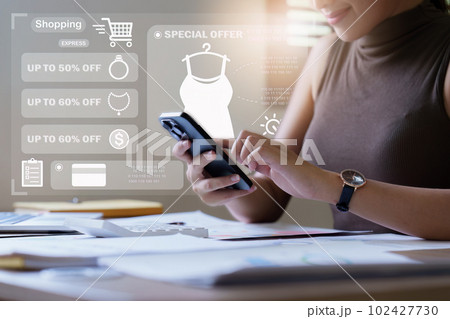 Online store icon, shopping on internet, Asian woman using on virtual screen with hands choosing on smartphone application Online store icon, shopping on internet, Asian woman using on virtual screen with hands choosing on smartphone application 102427730