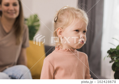 Deaf kid with hearing aid cochlear implant have fun with parents - Hear aid and medicine innovating technology and diversity concept 102428678