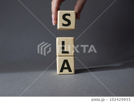 Premium Photo  Wooden cubes with letters abc arranged in a vertical  pyramid, grey and yellow background, business concept. sla - short for  service level agreement