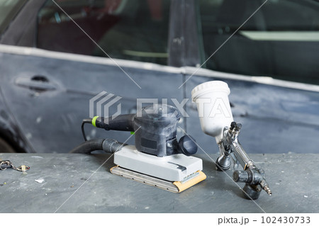 Hand sander and paint spray gun 102430733