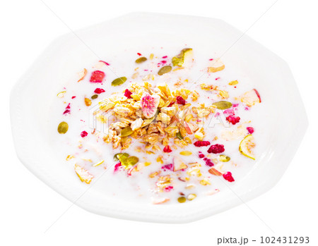 Granola with dried fruits and milk Granola with dried fruits and milk 102431293