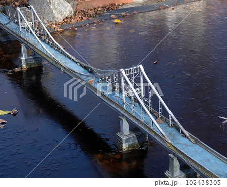 Kiev, Ukraine November 11, 2021: Museum of Miniatures - Pedestrian bridge in Kiev Kiev, Ukraine November 11, 2021: Museum of Miniatures - Pedestrian bridge in Kiev 102438305