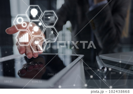 close up. businessman pressing his finger on the screen of the digital tablet 102438668