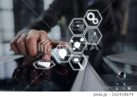 close up. businessman pressing his finger on the screen of the digital tablet 102438674