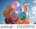 Multi-colored balloons in the sky with clouds. Summer party celebration concept. 102440591