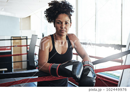 I refuse to lose. Portrait of a young woman training in a boxing ring. 102449976