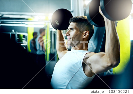 I lost my excuses and found my results. a man doing a upper-body workout at the gym. I lost my excuses and found my results. a man doing a upper-body workout at the gym. 102450322