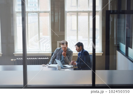 Theyll achieve success together. businessmen working in their office. Theyll achieve success together. businessmen working in their office. 102450350