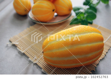 Sweet and crunchy Korean specialty Seongju melon summer fruit concept 102452763