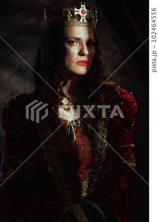 medieval queen in red dress with crown medieval queen in red dress with crown 102464556