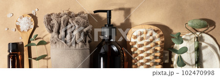 Natural cosmetic products, Zero waste, eco friendly bathroom accessories on beige background with leaves shadows 102470998