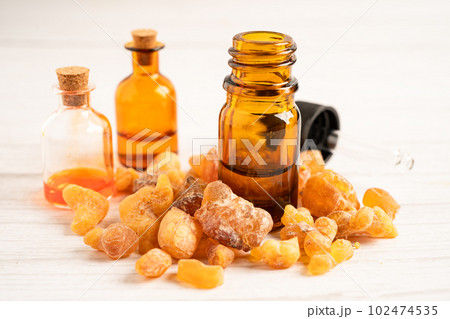 Frankincense or olibanum aromatic resin isolated on white background used in incense and perfumes. Frankincense or olibanum aromatic resin isolated on white background used in incense and perfumes. 102474535