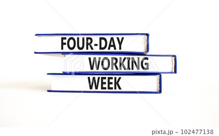 Four-day working week symbol. Concept words Four-day working week on books on a beautiful white table white background. Business and four-day working week concept. Copy space. 102477138