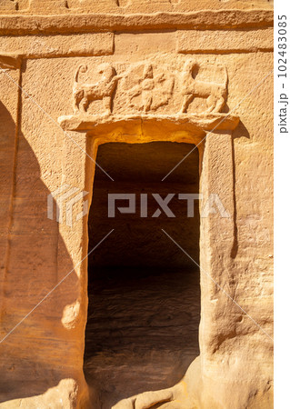 Carved ornamented entrance to the tomb at Jabal al banat complex, Hegra, Al Ula, Saudi Arabia Carved ornamented entrance to the tomb at Jabal al banat complex, Hegra, Al Ula, Saudi Arabia 102483085