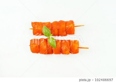 Chicken breast Fillets.Raw marinated chicken fillet skewers on a white background.Marinated Fresh.Closeup of chicken meat.Procurement for designers.Chicken fillet inner skewers.Food concept.Top view. Chicken breast Fillets.Raw marinated chicken fillet skewers on a white background.Marinated Fresh.Closeup of chicken meat.Procurement for designers.Chicken fillet inner skewers.Food concept.Top view. 102486697